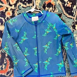 Hanna Andersson Blue Rashguard with Green Bat Pattern
